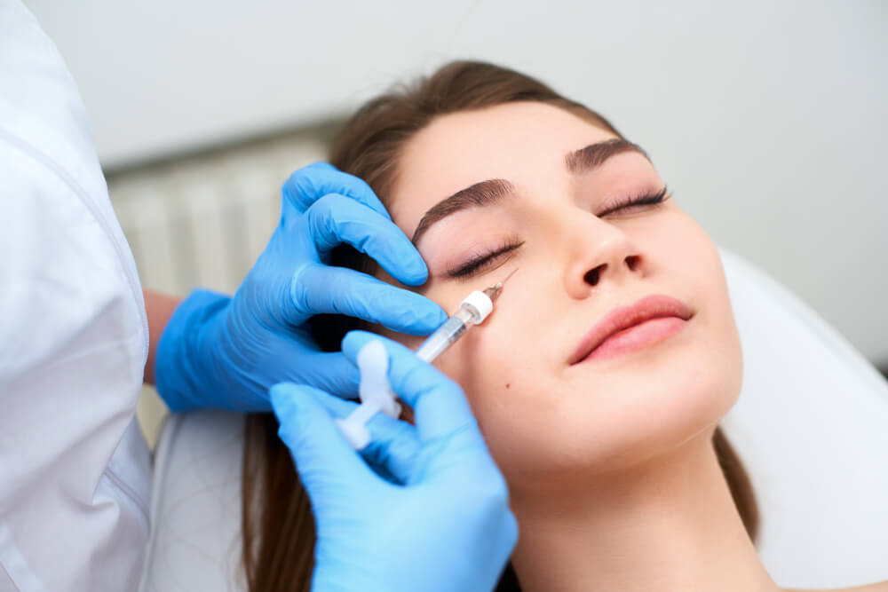 Woman receiving Botox in a aesthetic clinic