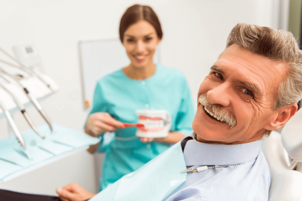 Elderly male patient visiting dental office for a check-up