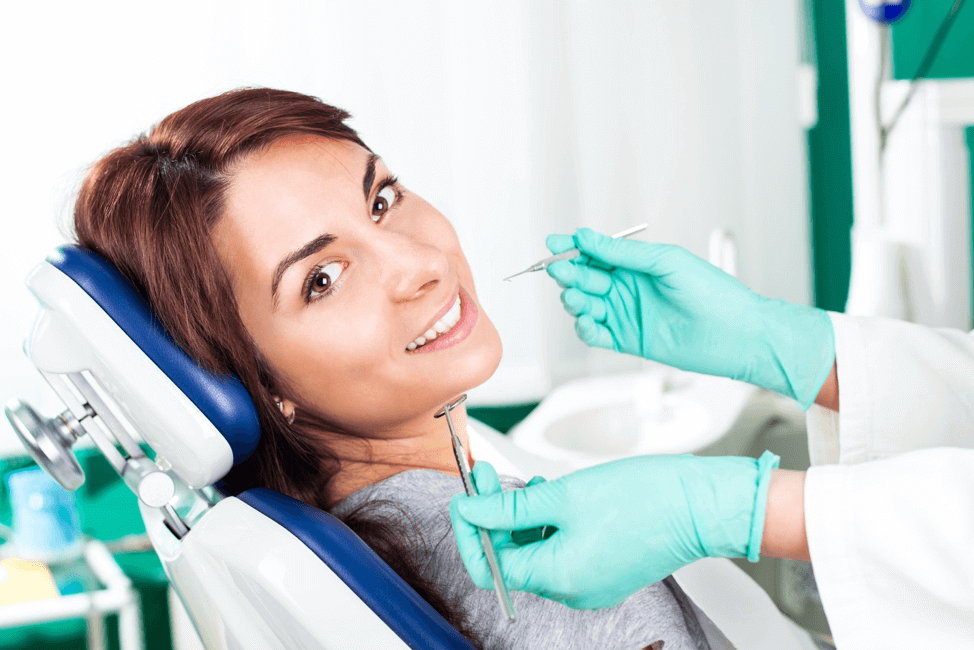 Female sitting an the dentist chair during a dentist appointment