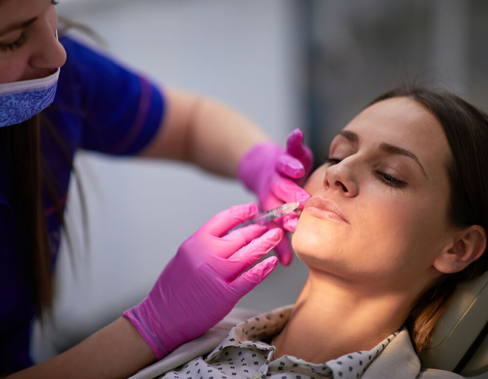 Woman Having Lip Treatment for the Elevation of Mouth Corners and Removing of Marionette Lines